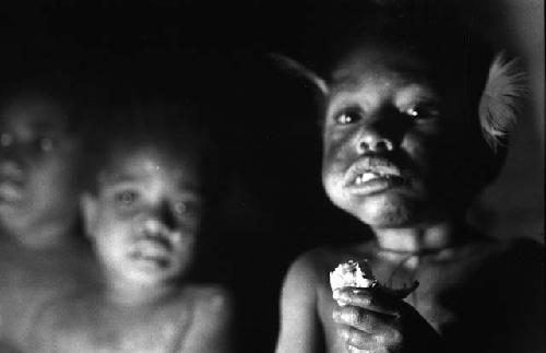 Samuel Putnam negatives, New Guinea; Children eating hiperi