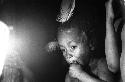 Samuel Putnam negatives, New Guinea; Child with feathers in his hair