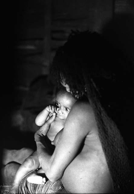 Samuel Putnam negatives, New Guinea; Ekapue and her new baby