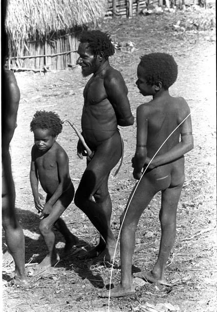 Karl Heider negatives, New Guinea; Man and  Boys