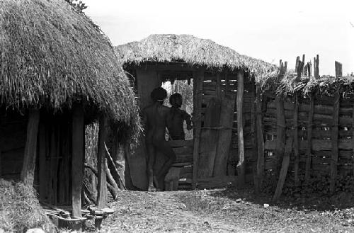 Karl Heider negatives, New Guinea; Men in Sili Entrance