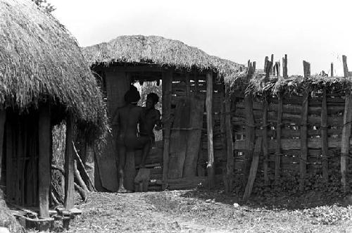 Karl Heider negatives, New Guinea; Men in Sili Entrance