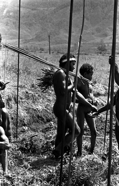 Karl Heider negatives, New Guinea; Men Waiting Near Frontier