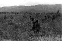 Karl Heider negatives, New Guinea; Men moving to action