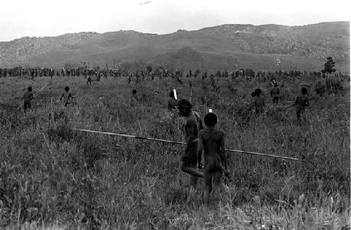 Karl Heider negatives, New Guinea; Men moving to action