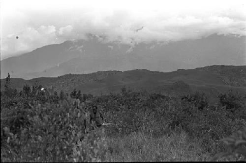 Karl Heider negatives, New Guinea; Men moving towards front