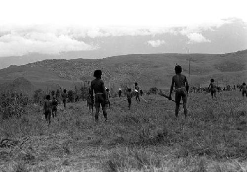 Karl Heider negatives, New Guinea; Men watching action