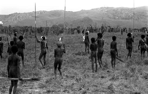 Karl Heider negatives, New Guinea; Many warriors watching