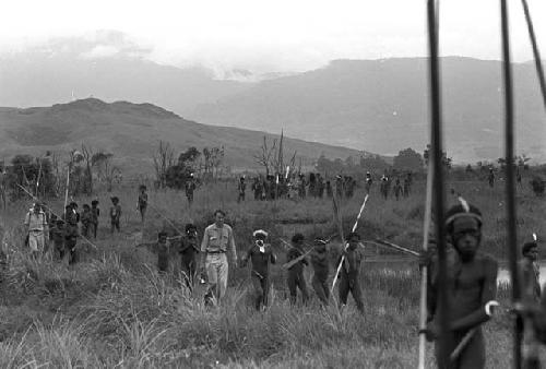 Karl Heider negatives, New Guinea; Robert Gardner and Peter Matthiessen coming back from the front