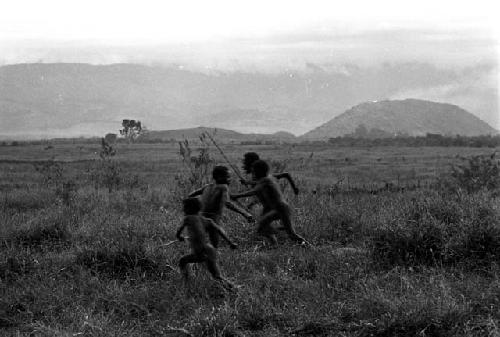 Karl Heider negatives, New Guinea; Boys retreating