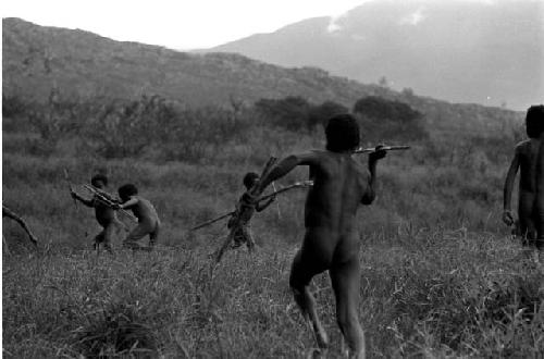 Karl Heider negatives, New Guinea; Boys hurling the spears