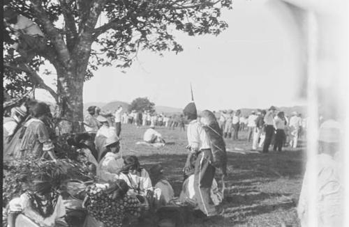 Man in costume, note especially the hat