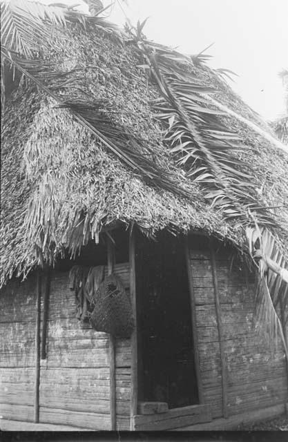 Pulling woven saddle board up on roof