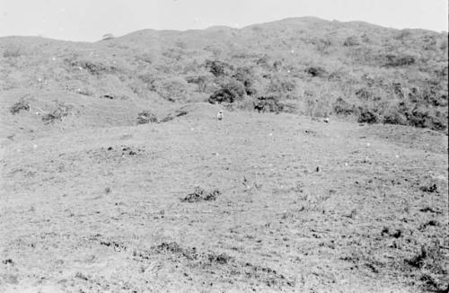 Ancient graveyard from which fire has been seen issuing.