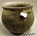 Ceramic jar, flared rim, plain, mended