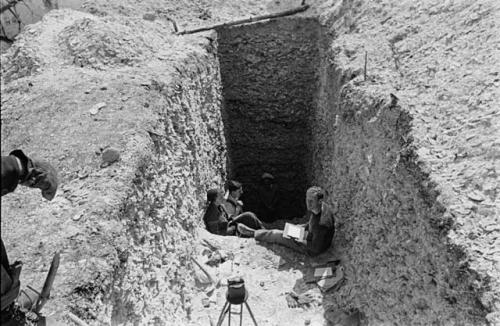 Group in trench I looking southwest at wall DE