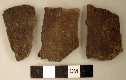 Coarse earthenware body sherds, cord impressed; three sherds crossmend; two sherds crossmended with glue