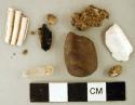 Shell fragments; quartz crystal; stone fragment; charcoal fragment; coarse earthenware body sherds, undecorated