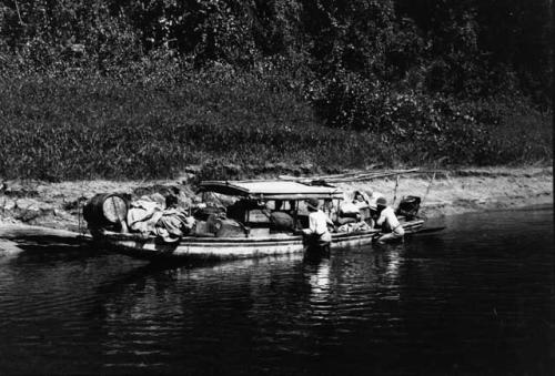 Views of Barama River at low water showing expedition boat at various stages of difficulties