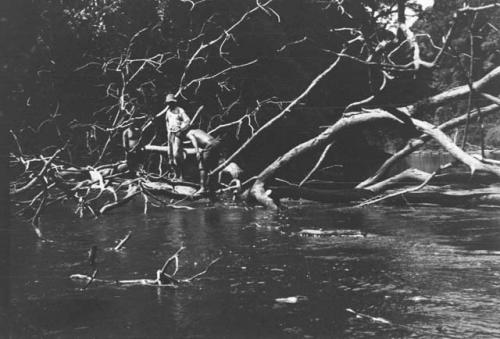 Views of Barama River at low water showing expedition boat in various stages of difficulties