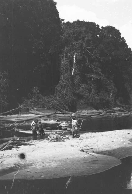 Views of Barama River at low water showing expedition boat in various stages of difficulties