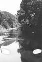 Views of Barama River at low water showing expedition boat in various stages of difficulties