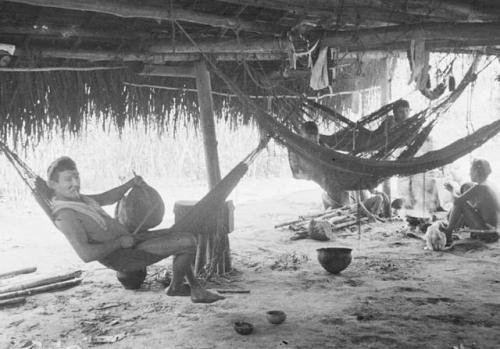 Miller playing his drum in his house at Sawari