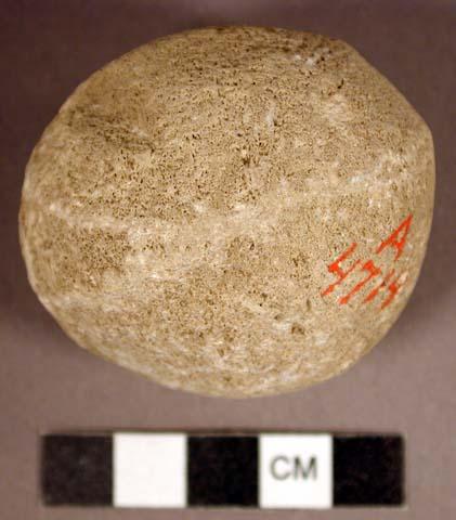 Ground stone, pecked and ground round stone object