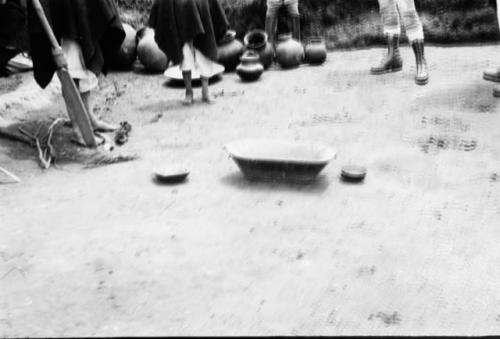 (left to right): wooden food dish, wooden mixing bowl, calabash drinking cup