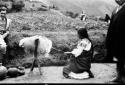 Woman spinning wool