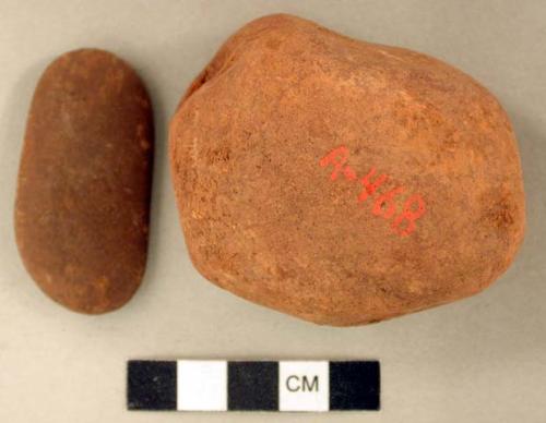 Stones, possibly worked, with possible orange pigment