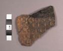 Never Delay Impressed-black Bowl Sherd: Impressed-incised Variety