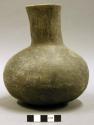 Ceramic vessel, complete, long flared neck