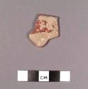 Restored body sherd with polychrome design