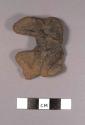 Mold-made figurine fragment