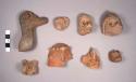 8 pottery animal heads