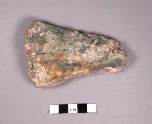 Worked stone tool that is pointed at one end