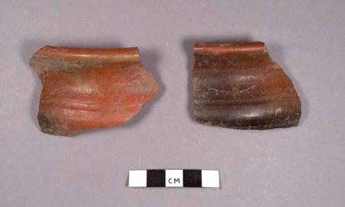 2 zinc orange ware potsherds