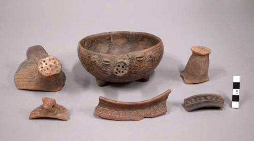 6 coarse incised black-brown ware sherds