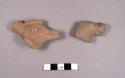 2 pottery animal effigy heads (broken from whistle) - probably Late Classic