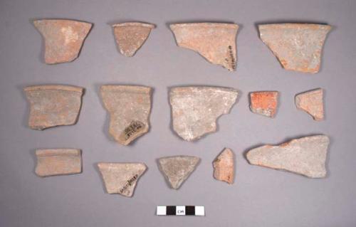 14 monochrome ware sherds from dishes with outcurving sides & out curved rims