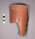 Red ware sherd from cylindrical base