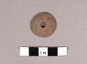 Small pottery spindle whorl