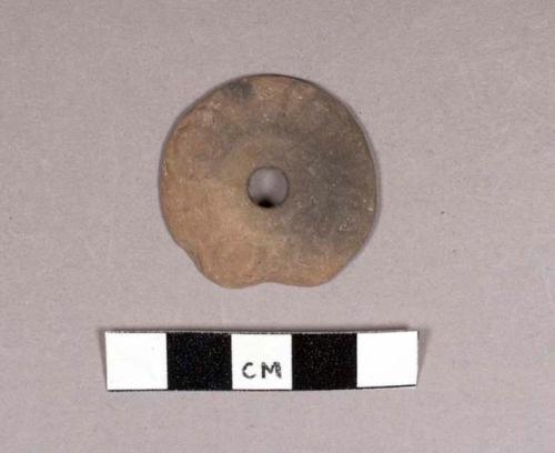 Small pottery spindle whorl