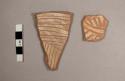 2 potsherds- painted white and incised inside