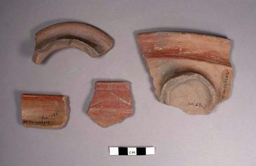 4 plain red rim potsherds