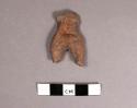 Pottery figurine body with traces of red paint