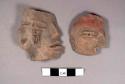 2 large hollow pottery ffigurine head fragments