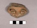 Pottery figurine body fragment
