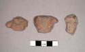 4 upper parts of pottery figurine bodies